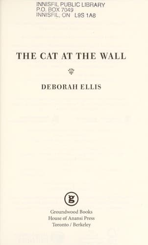 The cat at the wall